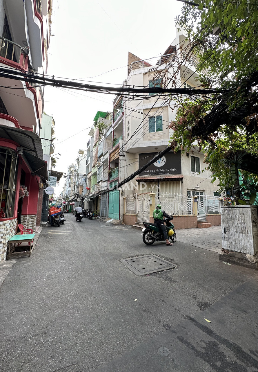 Nhà 4 tầng đường xe hơi đường Nguyễn Cảnh Chân Q1