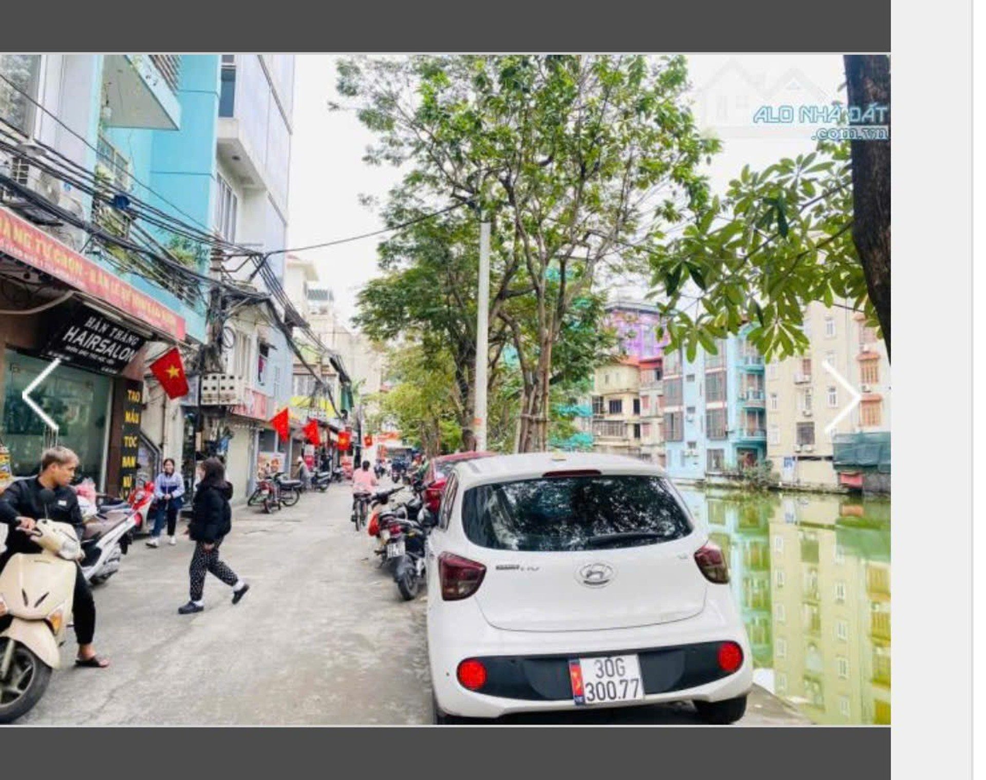 Bán nhà phố Chùa Láng 50m2 ô tô kinh doanh sầm uất, lô góc view hồ 21.8 tỷ