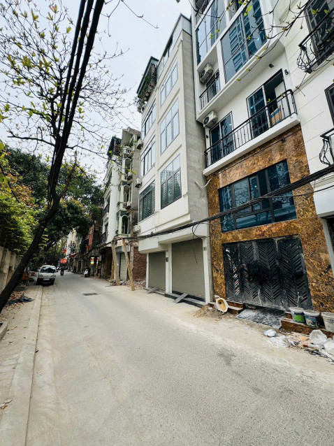 BÁN TÒA CĂN HỘ DỊCH VỤ CAO CẤP MẶT PHỐ CỰ LỘC - OTO TRÁNH - ĐỐI DIỆN ROYAL CITY - 18 PHÒNG KHÉP KÍN - DÒNG TIỀN 100TR/THÁNG - XÂY DỰNG 7 TẦNG