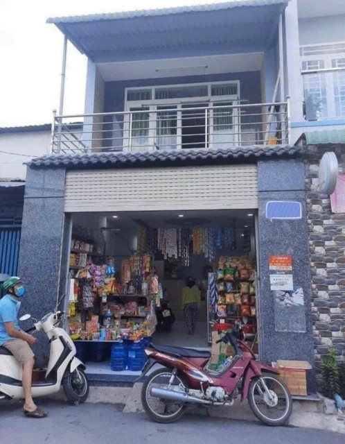 Do 2 vợ chồng làm ăn khó khăn muốn bán lại nhà 1 trệt 1 lầu Bình Chánh,sổ hồng riêng,full thổ cư
