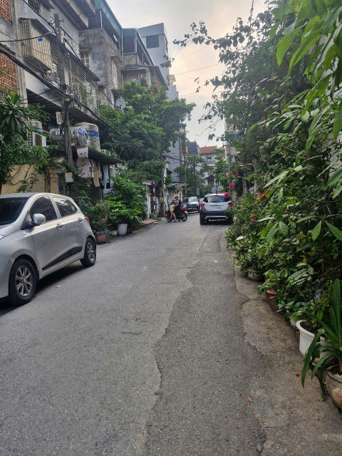 BÁN NHÀ HỒ ĐẮC DI, 3 THOÁNG, Ô TÔ, XÂY CCMN 7 tầng, thang máy, 116m, chỉ 23 tỷ5