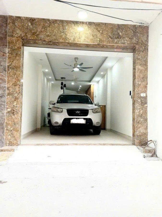 Bán Nhà Phạm Văn Đồng. GaRa OTO. Sát TP Giao Lưu An Bình CITY. Dt 45M 5 Tầng - 14.95 Tỷ