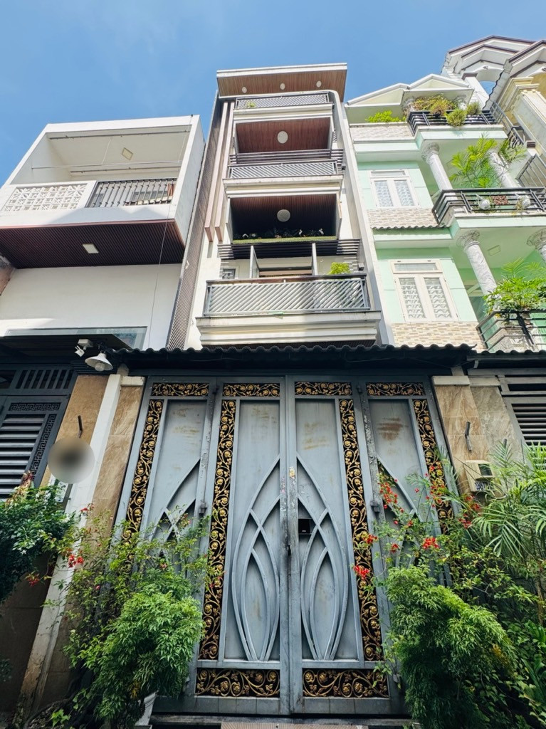 Gấp bán nhà 4 tầng, sổ hồng riêng, hẻm xe hơi 4 chổ
