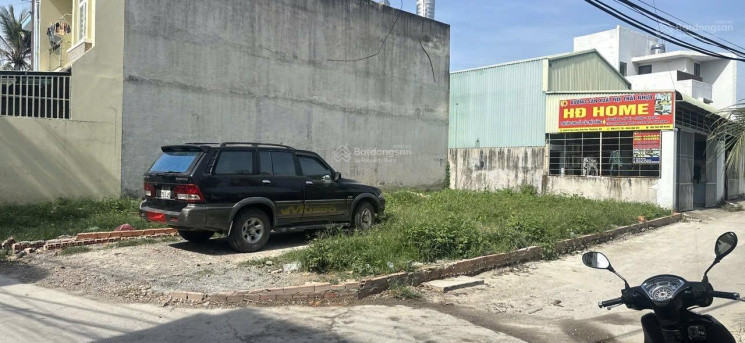 Bán lô đất ngay mặt tiền đường Quốc lộ 13 giá 2 tỷ dưới chân cầu Phú Long sổ hồng riêng
