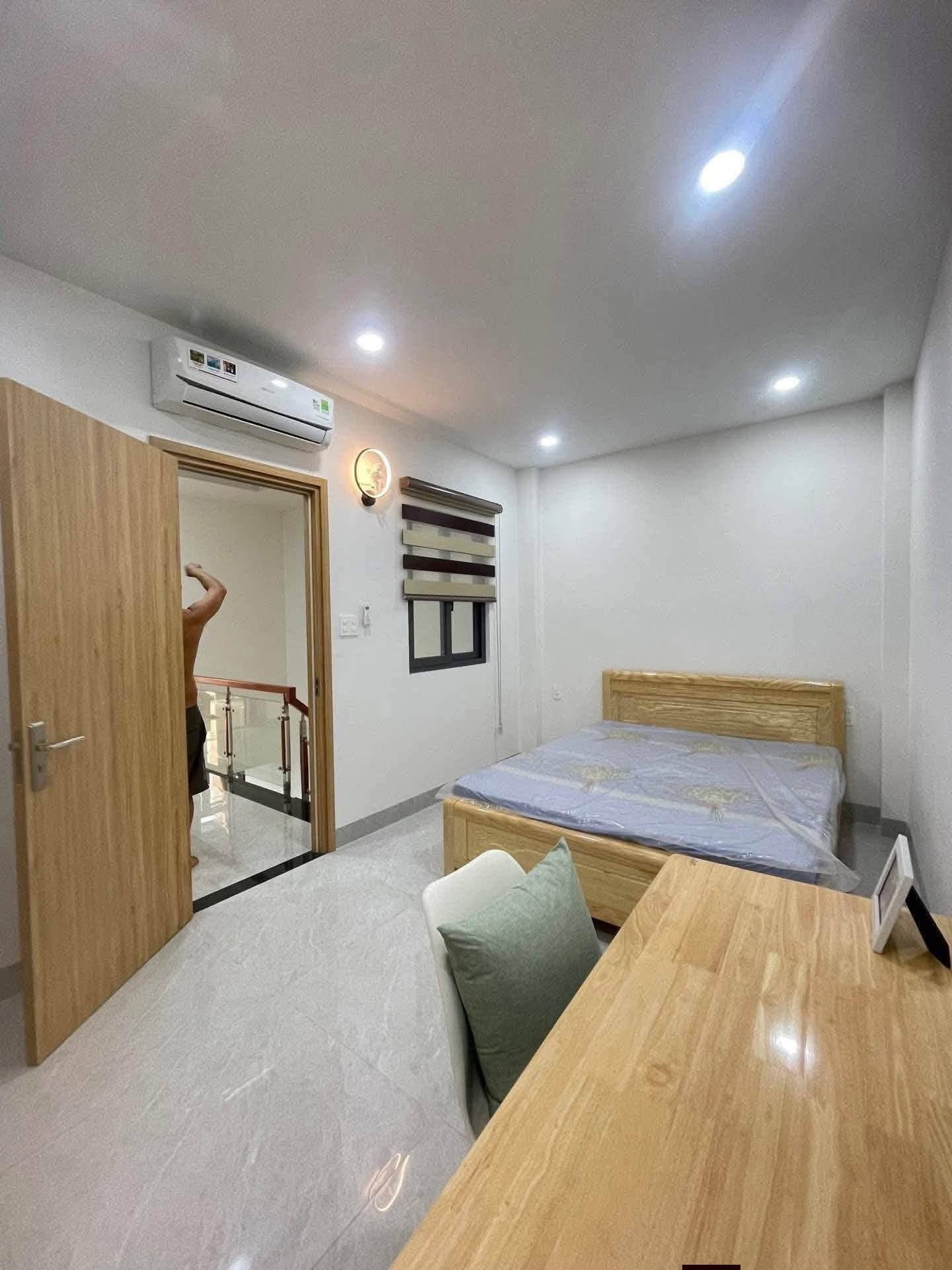 Bán nhà mới 5*20m lầu trệt. Mặt tiền nhựa Tân Hiệp. Hocmon