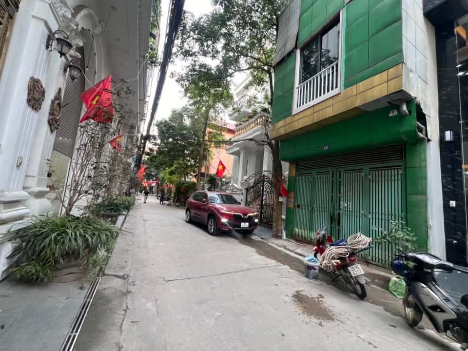 BÁN NHÀ PHỐ TÂN MAI. 90M2 XÂY 6 TẦNG. THANG MÁY. GARA Ô TÔ. KINH DOANH.