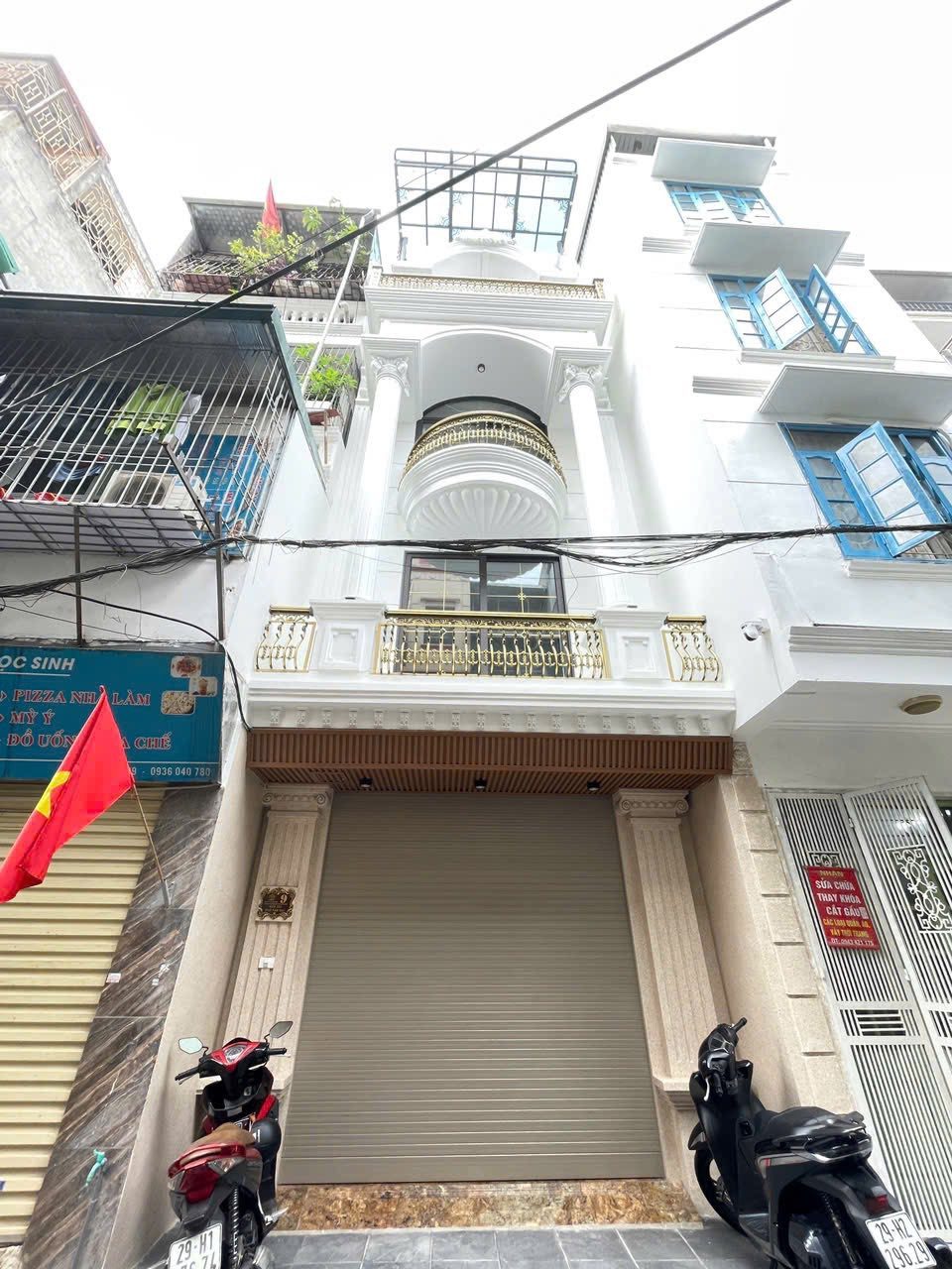 BÁN NHÀ ĐƯỜNG TÂN MAI. 55M2 - 6 TẦNG. THANG MÁY. GARA Ô TÔ.