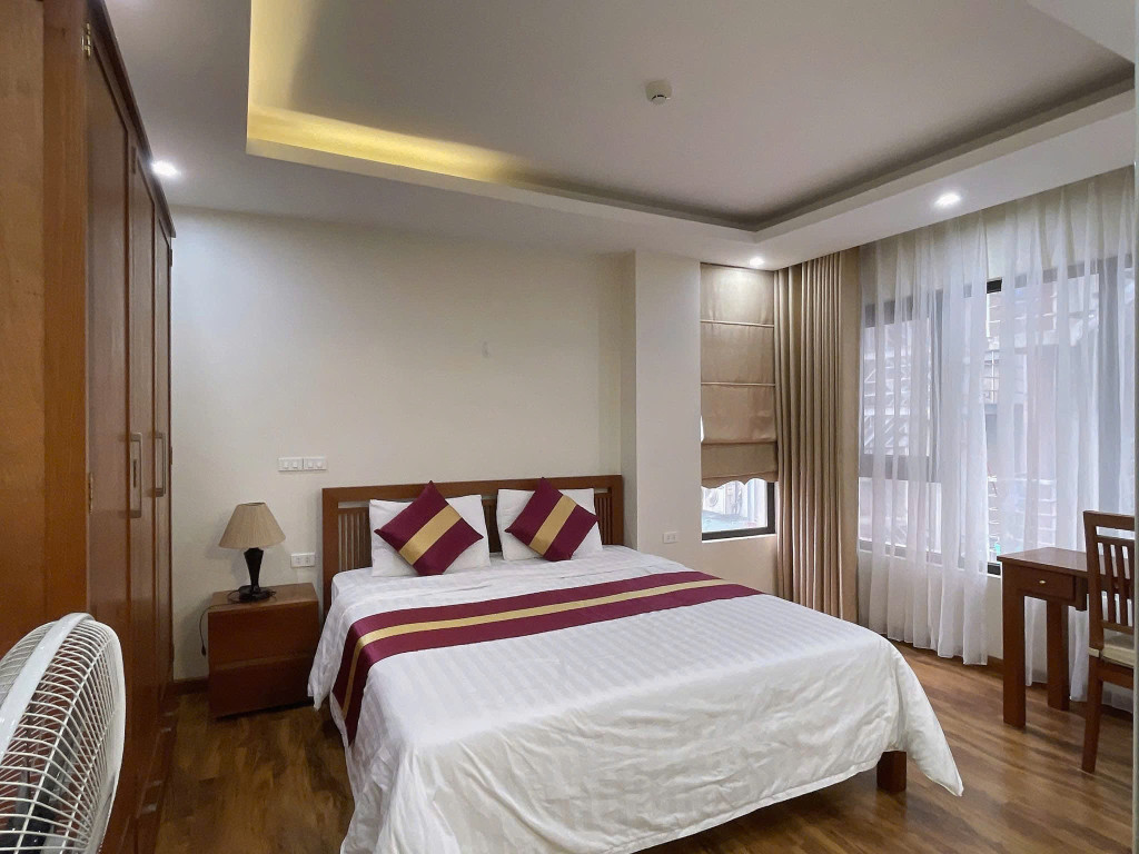 BÁN TÒA APARTMENT TRẦN THÁI TÔNG - LÔ GÓC 140M² x 9T - Ô TÔ TRÁNH - DÒNG TIỀN 200TR/TH