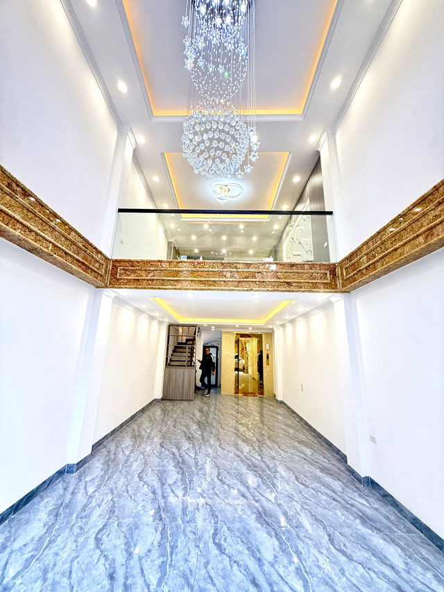 BÁN NHÀ MỚI PHÂN LÔ TAM TRINH - 8T THANG MÁY X 52M2 - GARA Ô TÔ - NGÕ THÔNG 5M - NỞ HẬU