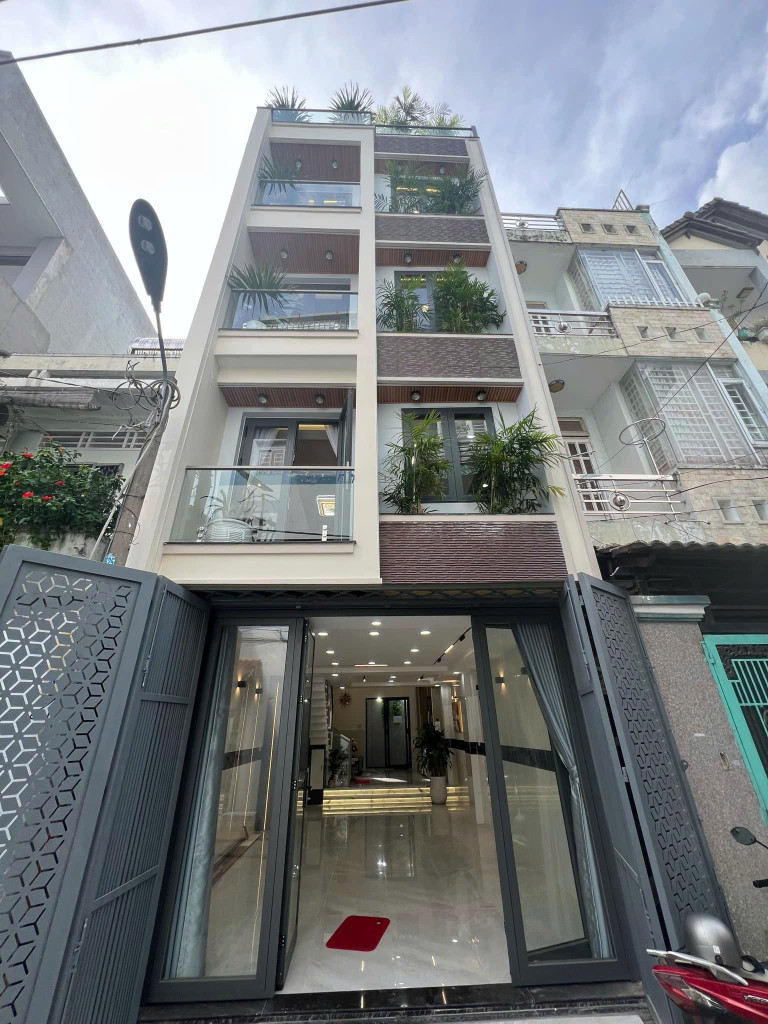 Bán nhà Hẻm xe hơi Nguyễn Tư Giản - gần Emart Phan Huy Ích, 4,2x14m, 5 Tầng, 8,9 tỷ.