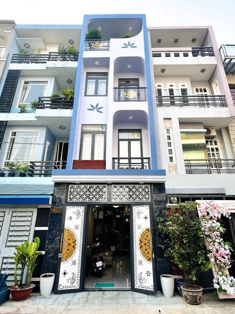 Bán nhà sổ hồng riêng gò vấp 5 tầng thang máy