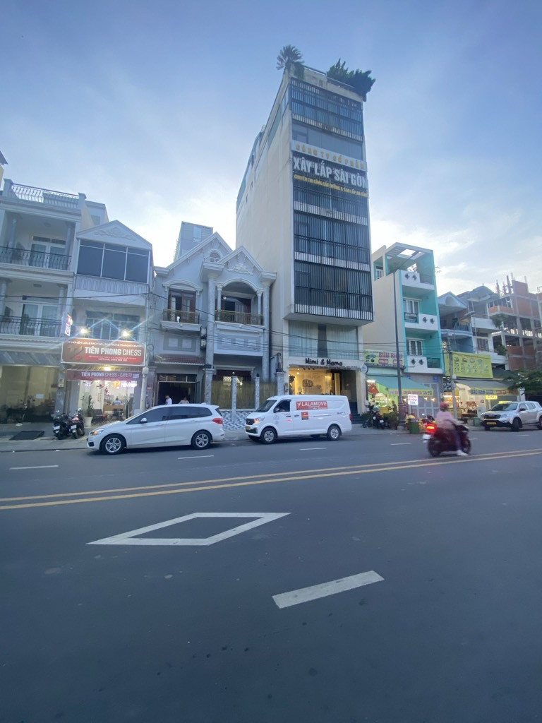 Bán nhà MT 102m² - 4 Tầng, giá 25.6 tỷ Phường 12 , Tân Bình