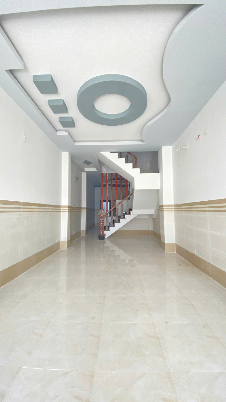 NHÀ 1 TRỆT 3 LẦU NGAY CHỢ CÁI VỒN THỊ XÃ BÌNH MINH.