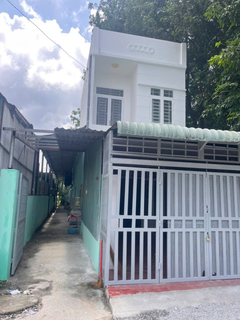 Bán dãy trọ và nhà 1 lầu đang cho thu nhập đều