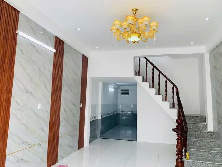 NHÀ MẶT TIỀN NGAY HOÀ LỢI BẾN CÁT