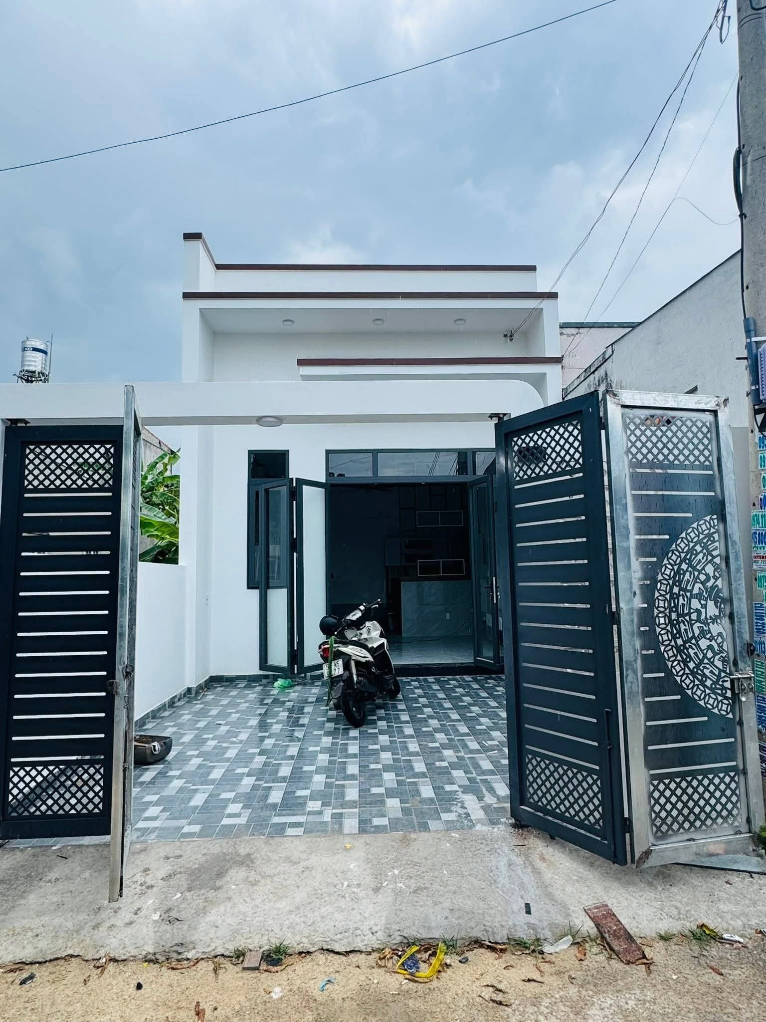 Cần bán gấp căn nhà mới , ngay trung tâm TP Bến cát , bình dương củ