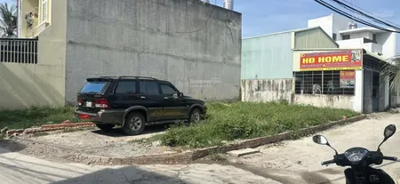 Bán lô đất ngay mặt tiền đường Quốc lộ 13 giá 2 tỷ dưới chân cầu Phú Long sổ hồng riêng