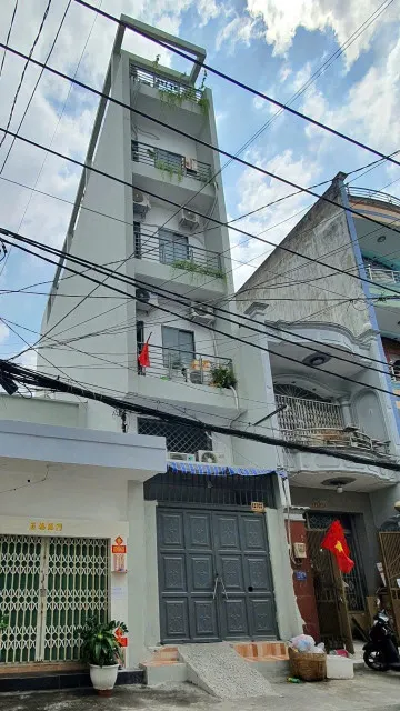 Bán nhà 5 tầng có 15 phòng căn hộ Dv .đường âu cơ hẻm nhựa xe tải