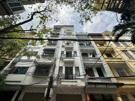 (Tin thật 100%). Bán nhà 2 mặt tiền 68m2 x 7T tại Trần Vỹ - Phân lô ô tô tránh - Dòng tiền 1 tỷ/năm