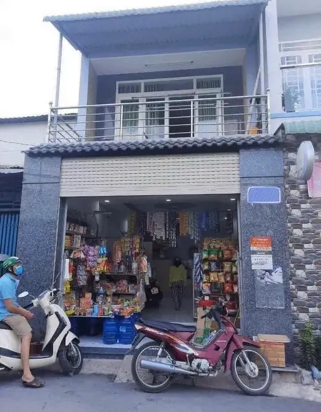 Do 2 vợ chồng làm ăn khó khăn muốn bán lại nhà 1 trệt 1 lầu Bình Chánh,sổ hồng riêng,full thổ cư