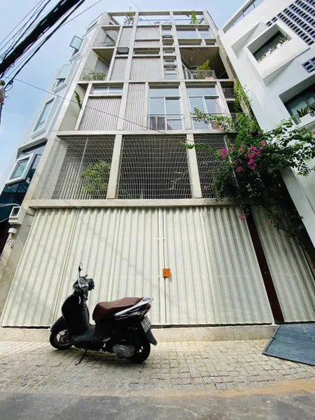 Nhà 4 tầng + lửng, thang máy, 11 phòng – MT Nguyễn Duy, Bình Thạnh – Giá 19 tỷ!