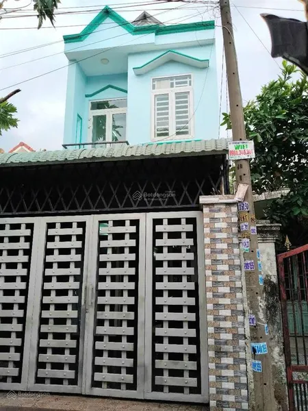 Bán nhà trệt lầu gần chợ, sân vận động dĩ an kdc hiện hữu an ninh