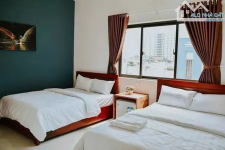 BÁN TÒA NHÀ 4 TẦNG CĂN HỘ KHÁCH SẠN - PHỐ BIỂN MỸ KHÊ - 10 PHÒNG FULL - DÒNG TIỀN 120 TR/
