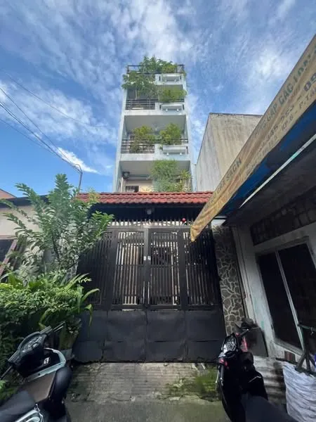 MẶT TIỀN ĐÔNG HƯNG THUẬN SÁT TRƯỜNG CHINH - CÓ SÂN ĐẬU OTO - GẦN 100M2 - 5 TẦNG - CHỈ 6.x TỶ.