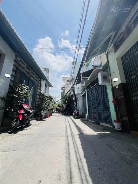 Bán nhà bùi văn ba (xe hơi đậu cửa) 76m2 tiện xây mới thu nhập 13tr/tháng sổ hồng cầm tay