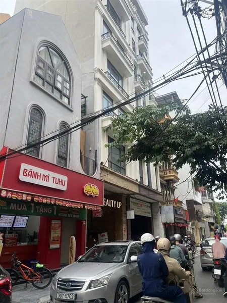 Nhỉnh 300tr/m2 có siêu tòa vp mặt phố, lô góc nguyễn hoàng 20 ôtô đỗ dt270m2 8t mt11m giá 93 tỷ