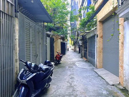BÁN NHÀ ĐƯỜNG THÁI THỊNH. 7 TẦNG. THANG MÁY. KINH DOANH.