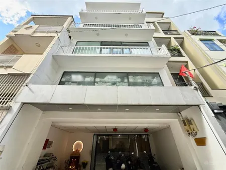 Toà nhà văn phòng huỳnh văn bánh, phú nhuận xe hơi ngủ trong nhà 6 tầng thang máy