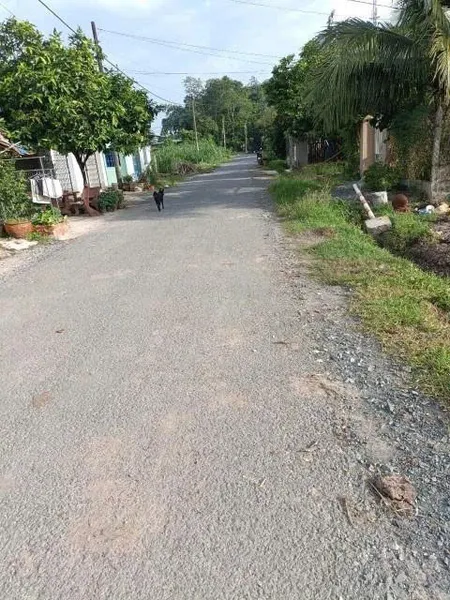 Bán lô đất mặt tiền đường nhựa 566, Trung Lập Hạ, Củ Chi, DT 448m² (300m² thổ cư), giá 2,7 tỷ.