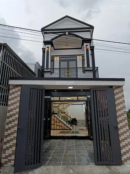 Nhà tân phước khánh sân xe hơi. lầu trệt. đường nhựa 6m giá 2t7
