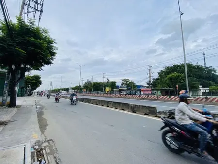 Bán nhà Mặt tiền Quốc Lộ 1A - gần Tân Kỳ Tân Quý, 14x34m, Cấp 4, cho thuê 45 tr, 25 tỷ.