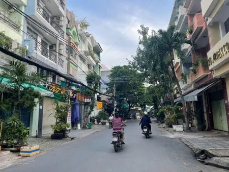 Bán căn nhà mt đuờng nguyễn hiến lê p13, tb, dt 5x24m nhà trệt 4 lầu, st, nhà mới, 24,5 ty tl