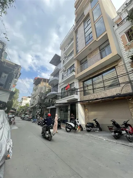 Toà nhà mặt phố thịnh quang 93m2 x 9 tầng thang máy cao nhất khu trung tâm đống đa