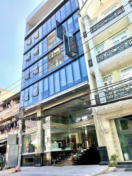 Cho thuê tòa nhà văn phòng 8 tầng. Hẻm 69/23 - 25 Đường Nguyễn Cửu Đàm, P. TSN, Q. Tân Phú
