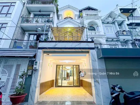 Nhà thang máy full nội thất cao cấp dt 4x18,5m xây 1trệt 2lầu sân thượng 4pn đường 8m thông giáp q7