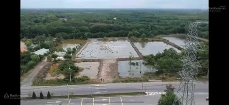 Bán 5.500m² đất mặt tiền đường rừng sác sau lưng giáp rạch lớn giá chỉ 15 triệu/m²