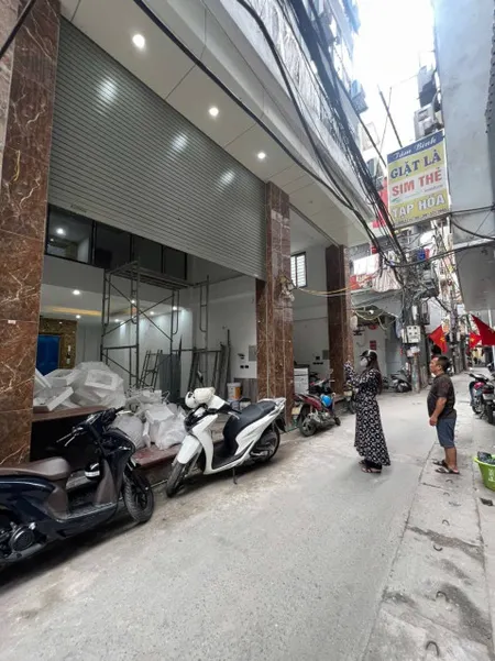 BÁN NHÀ MẶT NGÕ Ô TÔ ĐƯỜNG VŨ TÔNG PHAN. 65M2 - 7 TẦNG. THANG MÁY.