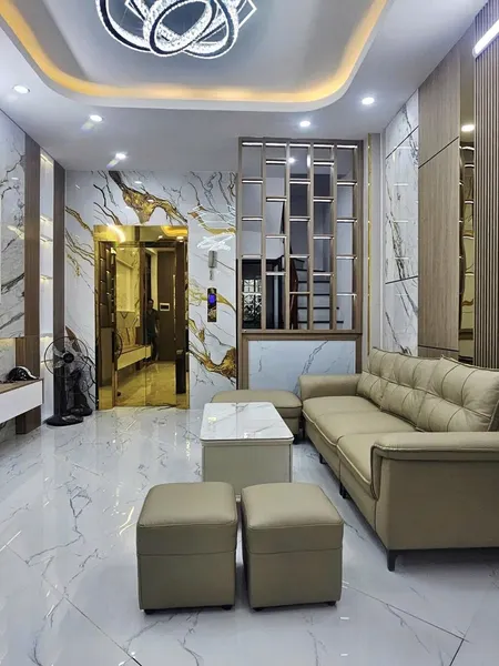 Bán Nhà đống đa 43m 7 Tầng Thang Máy ô Tô đỗ Cửa Cách Phố 5m