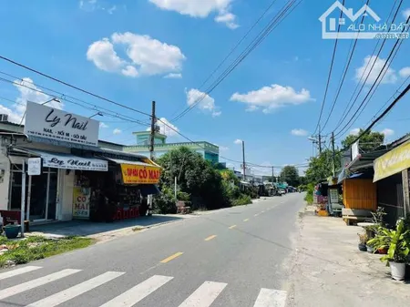 Lô đất 2 MT đường nhựa Trần Tử Bình, Củ Chi, 820tr/180m2 full thổ, sổ hồng riêng