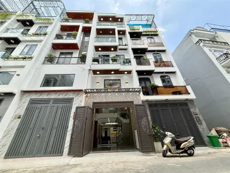 Nhà bên chợ, đường thông trần quang cơ, dt 4.2x13m, lửng, 3lầu, 4pn, gara ô tô, sân thượng, 6,3 tỷ