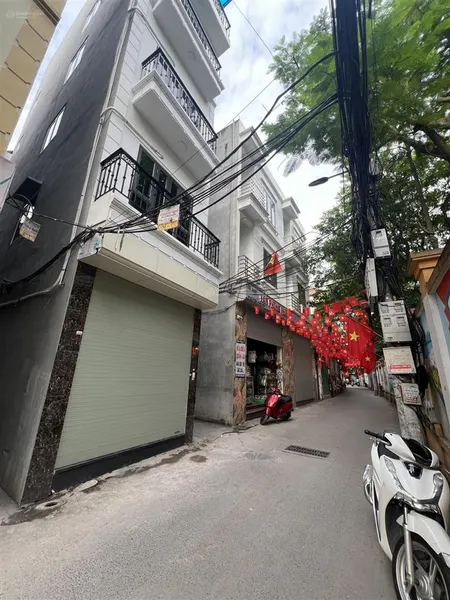 Phân lô vĩnh hưng lô góc 3 thoáng gara oto kinh doanh thang máy 6 tầng gần đường lớn