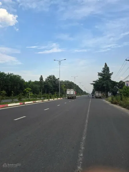 Bán lô đất mặt tiền đường bê tông xe ô tô sổ hồng riêng thổ cư