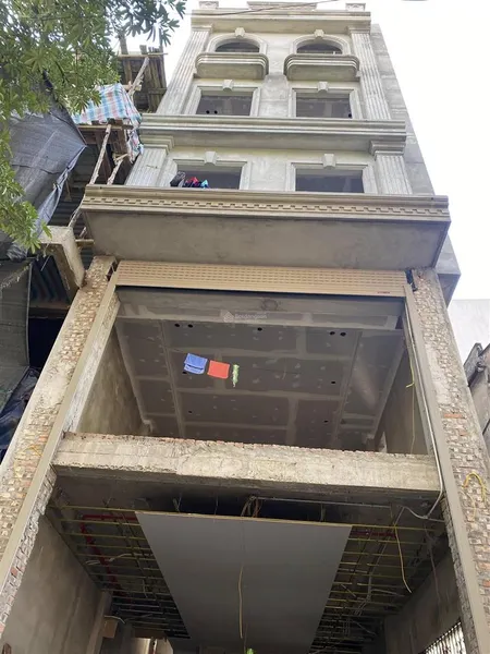 (lô góc)bán nhà mặt ngõ phạm văn đồng 55mx7t oto tránh kinh doanh thang máy 17 tỷ đang xây 3 thoáng