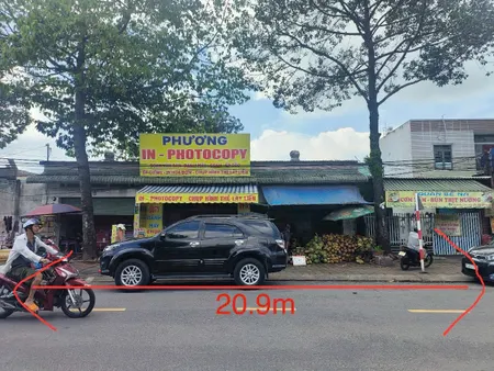 Mt kinh doanh Phan Đăng Lưu-Hiệp An cũ (phường Phú An-TP.HCM) 21m mặt tiền đường gồm căn nhà cấp 4 và 3 căn kiot cho thuê 15tr/tháng