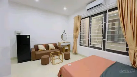 Bán gấp căn hộ dịch vụ 7t thang mát ngõ 3m oto qua cửa 22p khép kín full đồ dòng tiền 1tỷ/năm