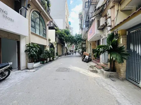 Lô góc 7 tầng thang máy đường thông kinh doanh ô tô .